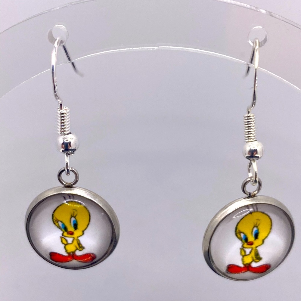 Cute little silver tone tweety bird earrings with sterling silver hooks